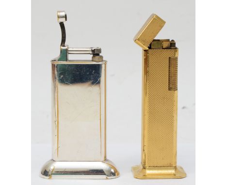 Dunhill, A textured gold plated 'Tallboy' gas table lighter, 11cm, and another chrome plated Dunhill table lighter. 