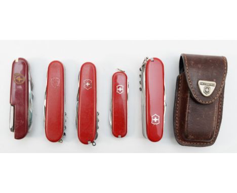 Victorinox, four Swiss army knifes and another example. 