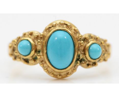 A 9ct gold synthetic turquoise three stone dress ring, M, 2.1gm. 