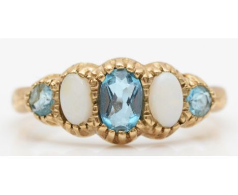 A 9ct gold topaz and opal five stone ring, O, 2.1gm. 