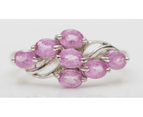 A 9ct white gold pink sapphire cluster ring, N-O, 2.7gm. 