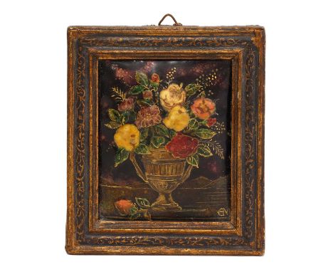 ▴ Ernestine Mills (1871-1959)An urn of flowerspainting on enamel12.2 x 10.6cm overall, in a hand-painted frameErnestine Evans