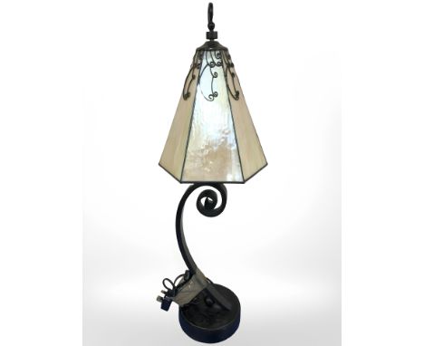 A metal table lamp with decorative glass shade, height 78 cm 