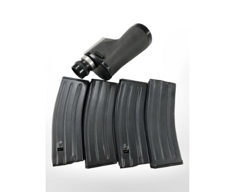 Four machine gun ammunition clips, together with an HGS scope.