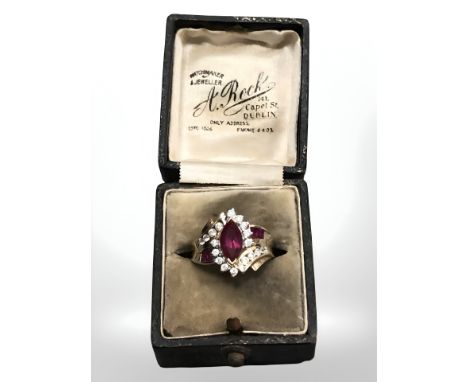 A 10ct yellow gold synthetic ruby and cubic zirconia ring, size N.  CONDITION REPORT: 3.6g