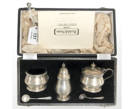 A three piece silver condiment set with spoons, Lindisfarne range, Birmingham, 1960, cased.  CONDITION REPORT: Gross weight: 