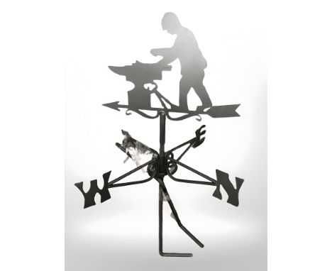 A blacksmith weather vane.
