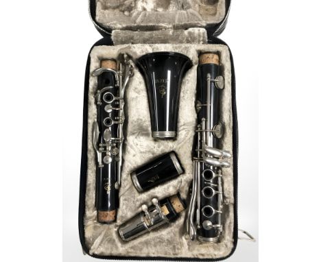 A Regent clarinet in case.
