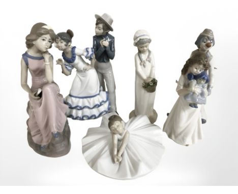 A group of ceramic figures including Nao ballerina, further Spanish cascade figures.