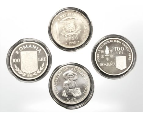 A Philippines 1976 25 Piso 0.500 silver coin, 24.7g, together with a Romania 1996 100 Lei (Canoe) 0.925 silver coin, 27.1g, a