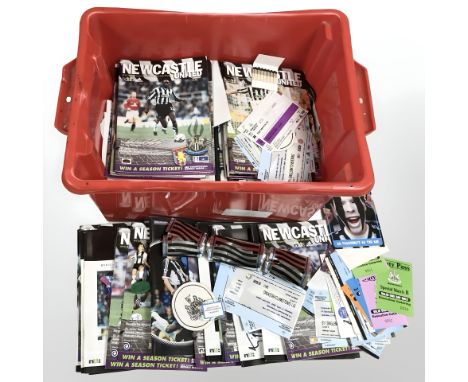 A box containing a good quantity of Newcastle United football programmes, tickets, match day programmes, etc. (1 box)