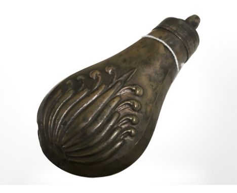 A 19th century copper powder flask.