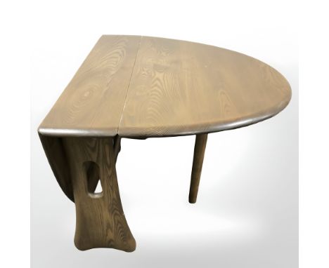 An Ercol elm small drop leaf table, width 70 cm 