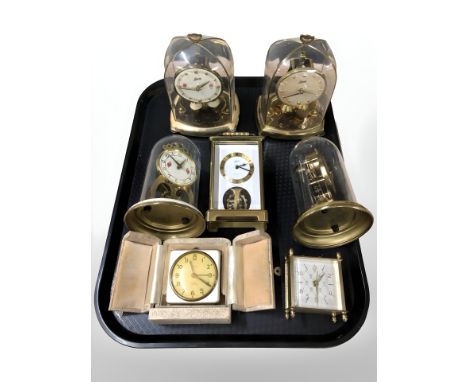 A group of vintage mantel clocks including Schatz, Smiths bedroom clock, etc.