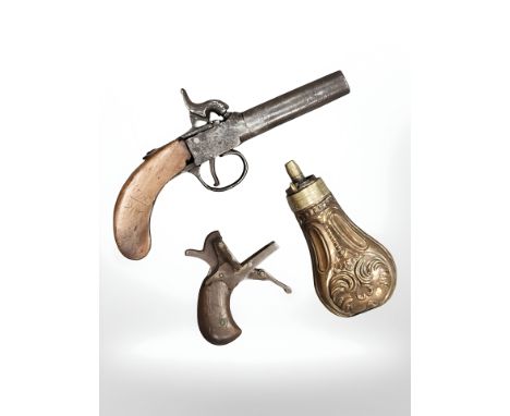 A 19th century percussion cap pistol with removable screw thread barrel, together with a copper powder flask and a part pinfi