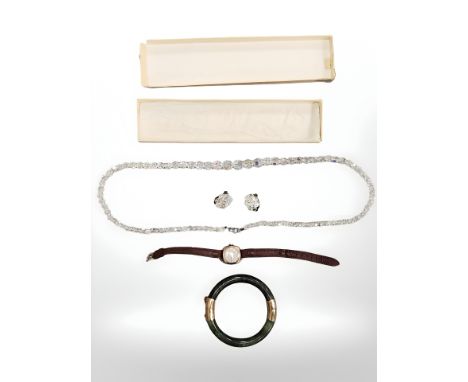 A vintage 9ct gold gent's Rotary wristwatch on brown leather strap, together with a crystal necklace with matching earrings a