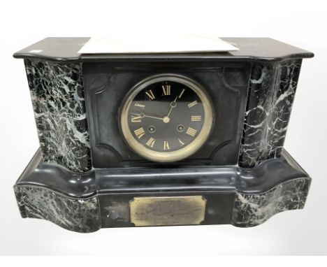 A Victorian black slate and green marble mantel clock, width 41 cm.