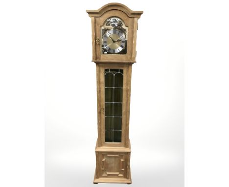 A light oak Tempus Fugit longcase clock 