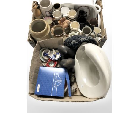 Two boxes of pottery including a William Row's stout bottle, ceramic mugs, cat figures, etc.