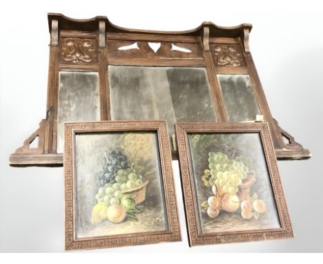An Art Nouveau style bevelled mirror, width 85 cm, together with two early 20th century still life oil paintings depicting fr