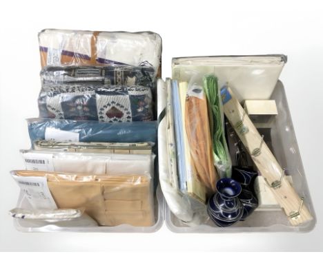 Two crates containing new retail stock items including storage shelf, vases, coat rack, packs of new curtains, etc.