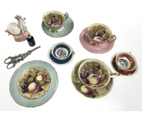 A tray of Aynsley fruit painted cup and saucers, cabinet plate, continental miniature cups, bisque figure, silver mounted cer