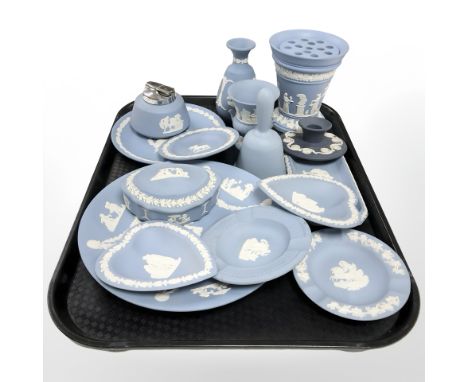 A group of Wedgwood blue and white jasperware porcelain to include dishes, trinket pot, flower vase, table lighter, etc.