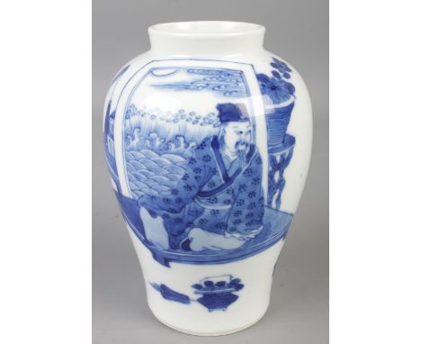 A Chinese blue &amp; white vase decorated with figures. Spurious Kangxi marks to the base. (12cm)  Nibbles to base. Marks in 