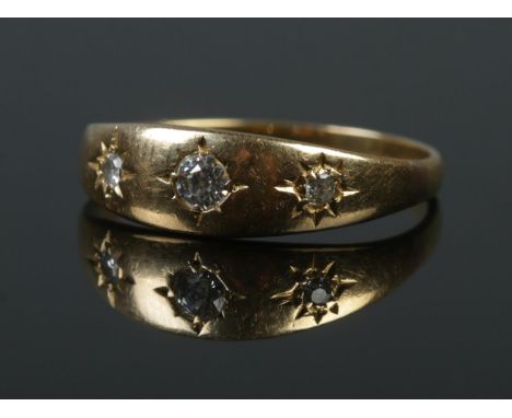 A Victorian 18ct gold three stone gypsy ring. Size P. 3.26g. Tested.  