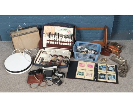 A quantity of miscellaneous. Includes cameras, musical boxes, postcards, Grundig reel to reel, picnic set, etc.  