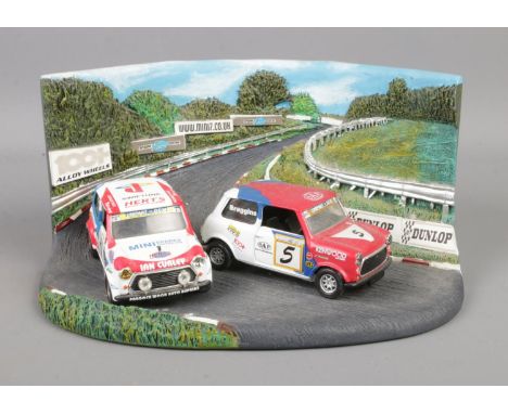 A Corgi 1:43 scale No. 05508 diorama comprising Mini Championship Winners Set; Mini Se7en and Mini Miglia at Brands Hatch.  