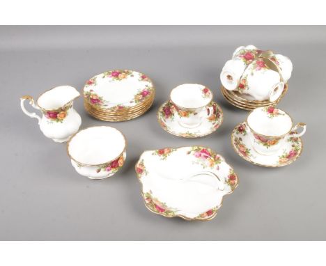 A Royal Albert Old Country Roses tea set including six tea cups and saucers, sugar bowl, milk jug and plates.  