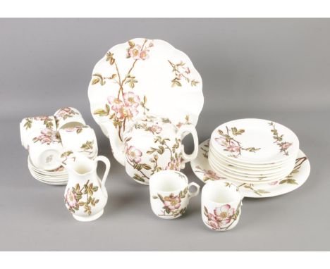 A Crescent and Sons George Jones tea service featuring pink floral decoration. Comprises of tea pot, milk jug, cake plate, et