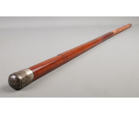 An early twentieth century silver topped Malacca swordstick; with the top assayed for Birmingham, 1919 by WH. Blade length: 3