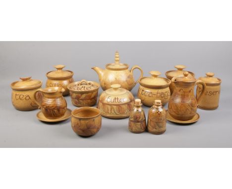 A collection of Alvingham studio pottery, to include tea pot, lidded sugar bowl, butter dish and cover and salt and pepper sh