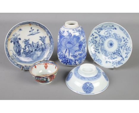 A collection of Chinese porcelain. Includes blue and white saucers, vase etc.  