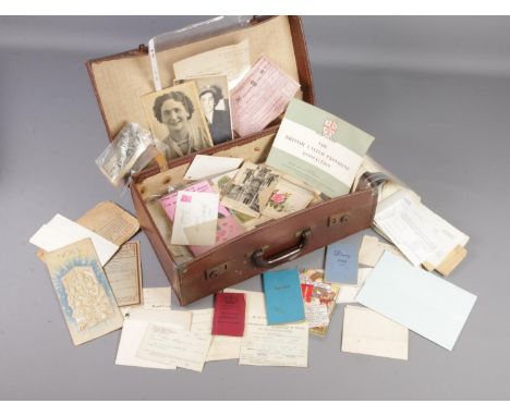 A suitcase with a large quantity of vintage ephemera mainly associated with Gladys Clarke, Fulham. Includes letters, medical,