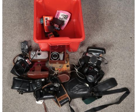 A box of photographic equipment. Including Minolta AL-F, Canon EOS100QD, Movikon 8, Pentax flash head, Exposure meter etc.  