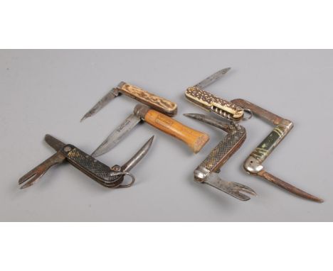 Six vintage folding knives, including 1943 Ibberson of Sheffield (bearing broad arrow mark), Opinel of France and Wade &amp; 