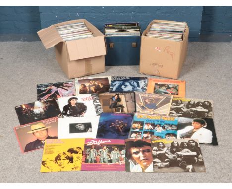 Three boxes of records including Rod Stewart, Paul Young, Status Quo, Bruce Springsteen, Michael Jackson, Abba, Slade, The Be