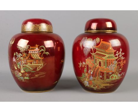 A pair of Carlton Ware lidded ginger jars. One in the Rouge Royale pattern and one similar. 18.5cm tall.  