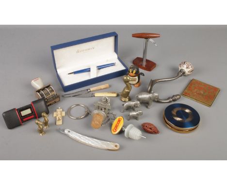 A box of collectables. Includes boxed Waterman pen, three graduated metal elephants, carved netsuke formed as a boat, etc.  