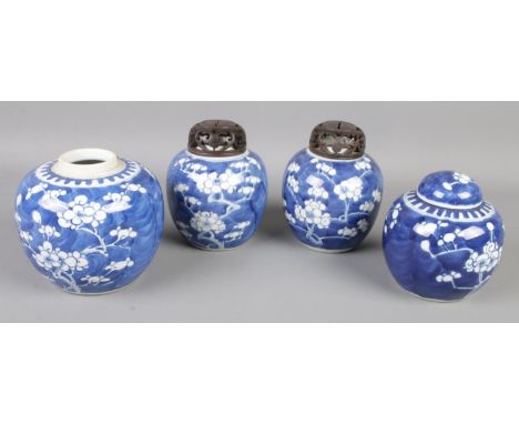 Four Oriental blue &amp; white ceramic ginger jars with Prunus Blossom decoration. Includes pair with wooden lids, etc. All b