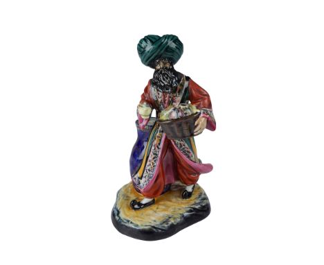Normally seen as a Flambe figurine. This rare Royal Doulton porcelain figurine depicting a man in a vibrant, richly detailed 