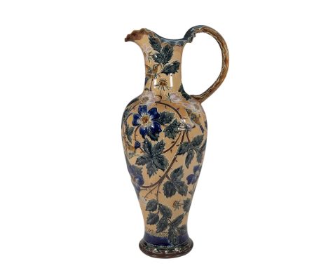 A palatial salt-glazed ewer beautifully decorated in an Art Nouveau style. Features small birds perched on thorn stems with p