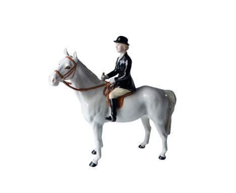 This exquisite ceramic figurine was crafted by the renowned British manufacturer Beswick and designed by the esteemed artist 