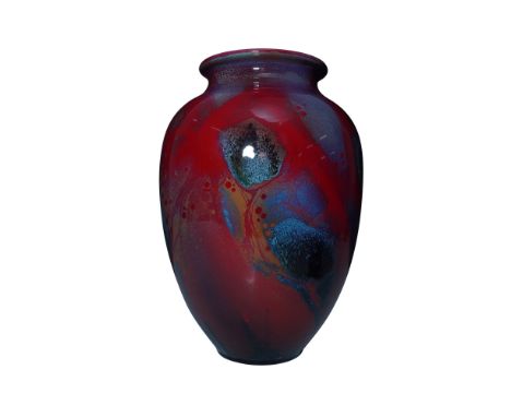 Stunning Royal Doulton Flambe Sung vase, a testament to the mastery of Charles Noke and Fred Allen. This striking example fea