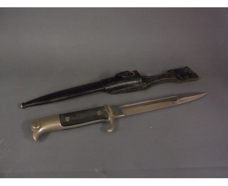 A WWII German Wermacht dress/walkout bayonet - 32cm long with original scabbard and frog - good condition with signs of use a
