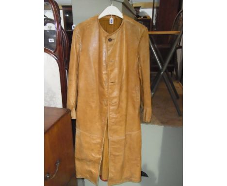 A First World War full length flying leather coat with buttons and lined interior
Condition report: Light wear to underarm's 
