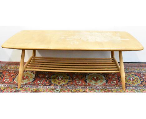 A mid 20th century, Ercol Windsor, elm and beech coffee table, model 459, on splayed supports joined by a spindled shelf belo